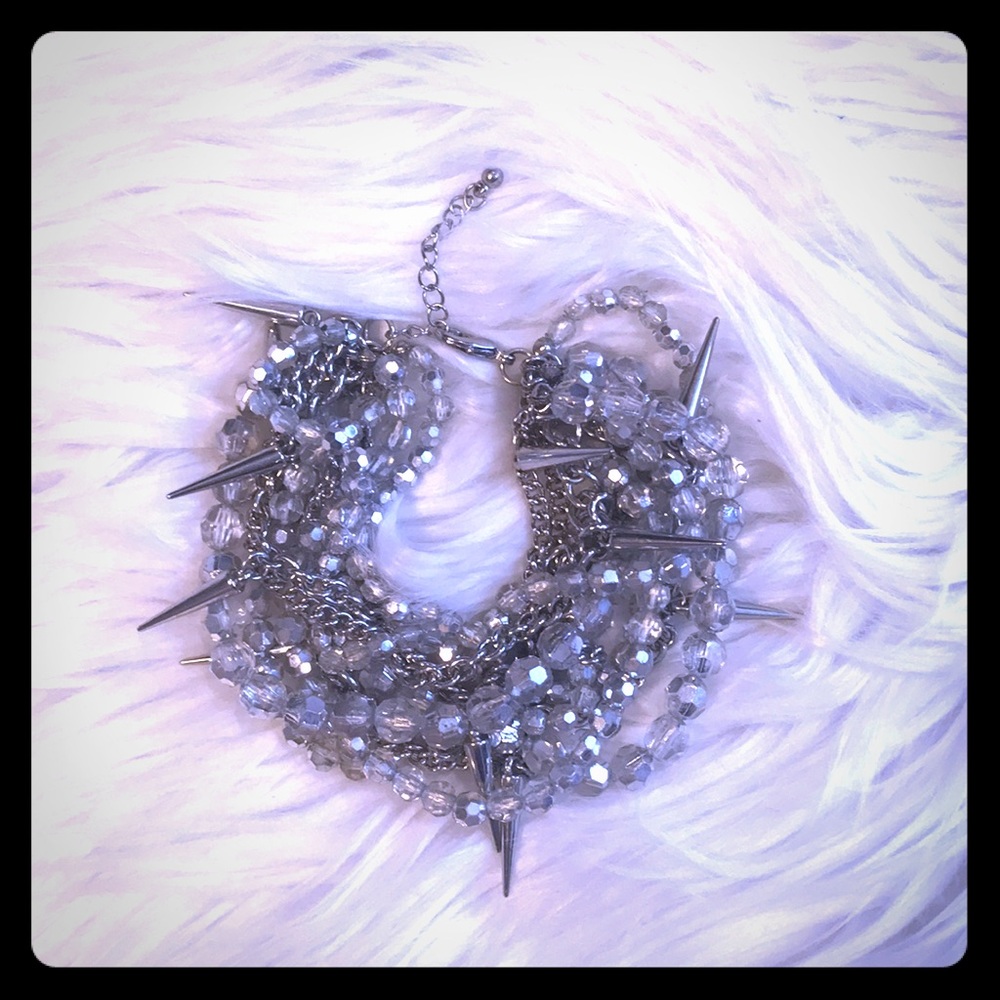 Fun bracelet with beads, chains and spikes!!